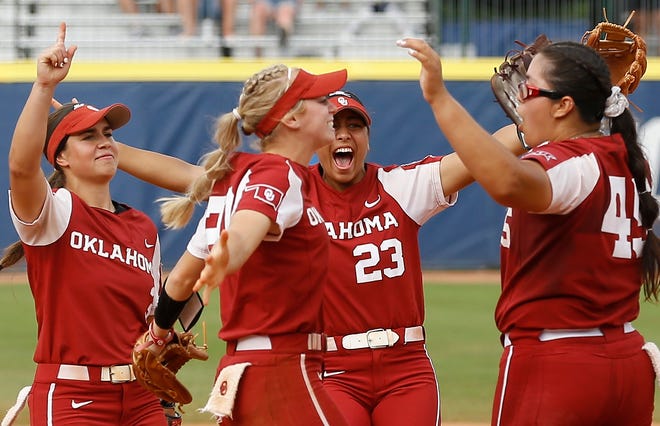 Oklahoma celebrates after defeating James Madison in the semifinals of the NCAA Women's College World Series.